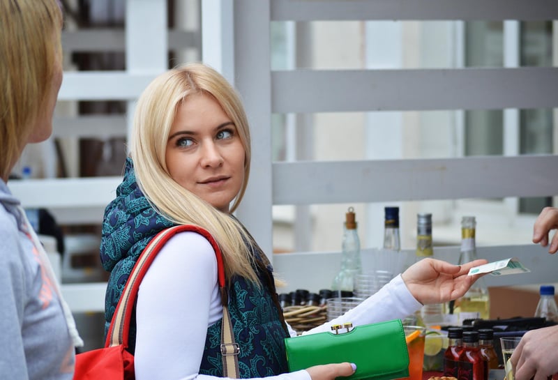 women paying with a credit card