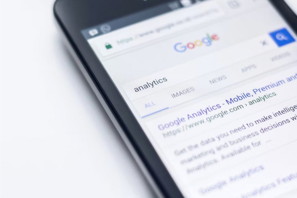 smarphone showing google analytics search 