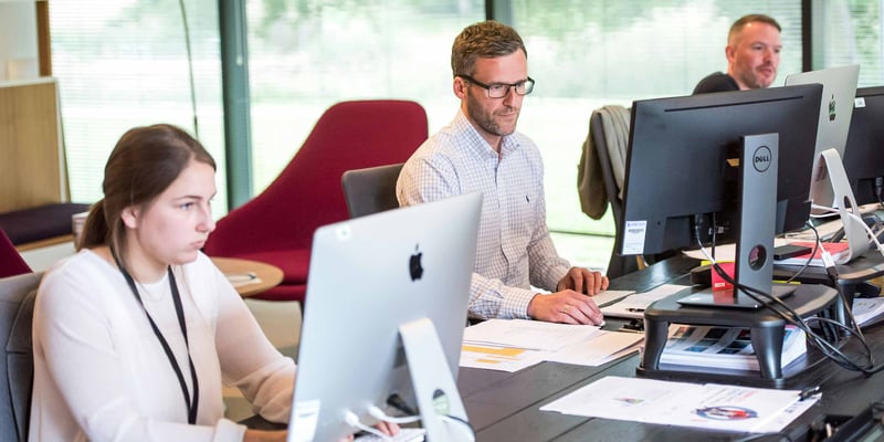 customer service representatives at computer 