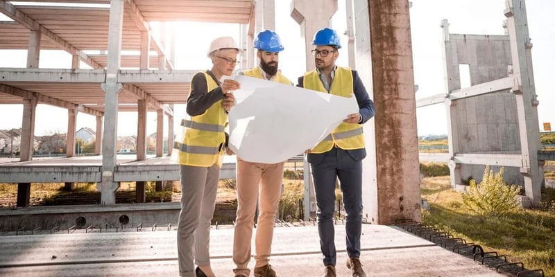 three construction workers 